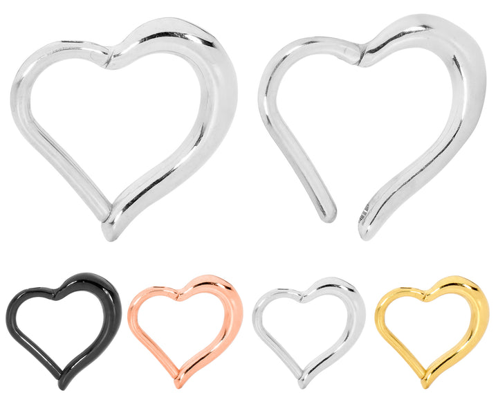 1 par de aros con segmentos de bisagra de acero inoxidable de 16 g con forma de corazón.