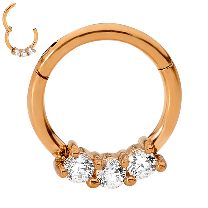 1 par de aretes tipo aro con bisagras de acero inoxidable de 16 g y 3 gemas.