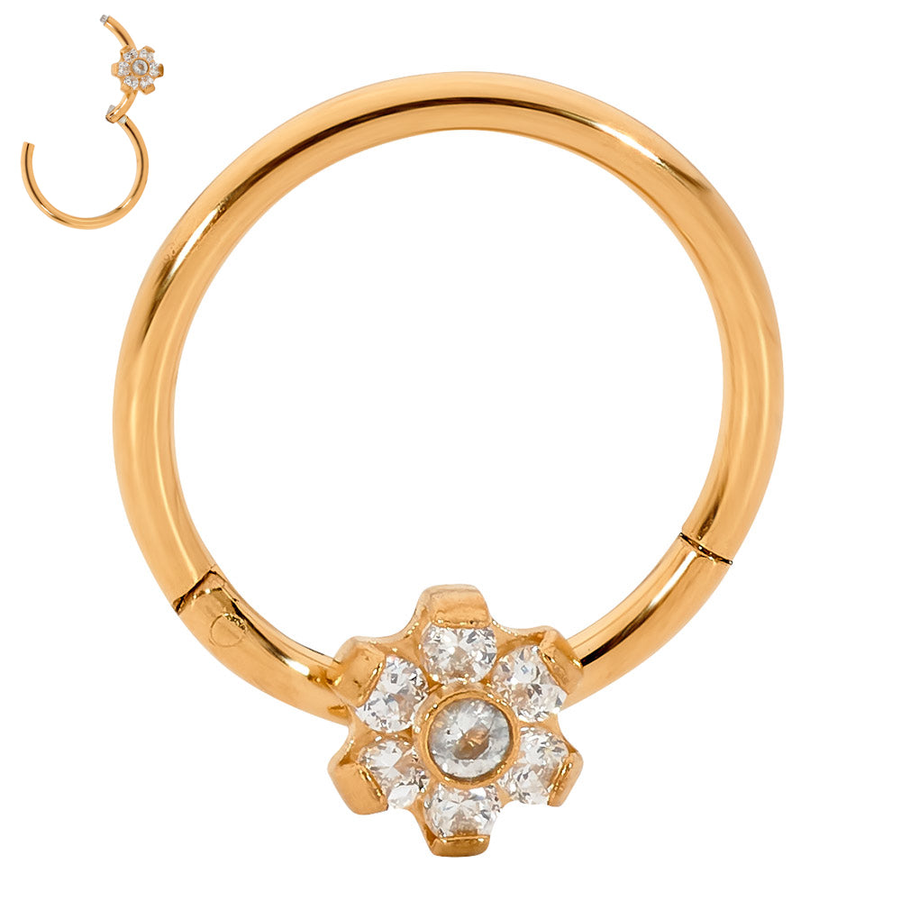 1 par de aros con segmentos de bisagra de acero inoxidable de 16 g con gemas y flores.